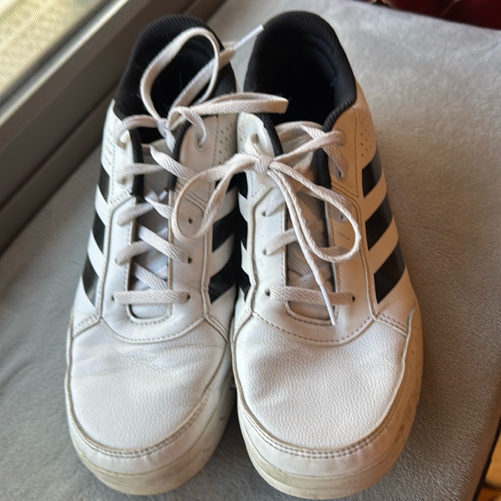 Girls size 6 leather Adidas sneakers. Pre-worn.